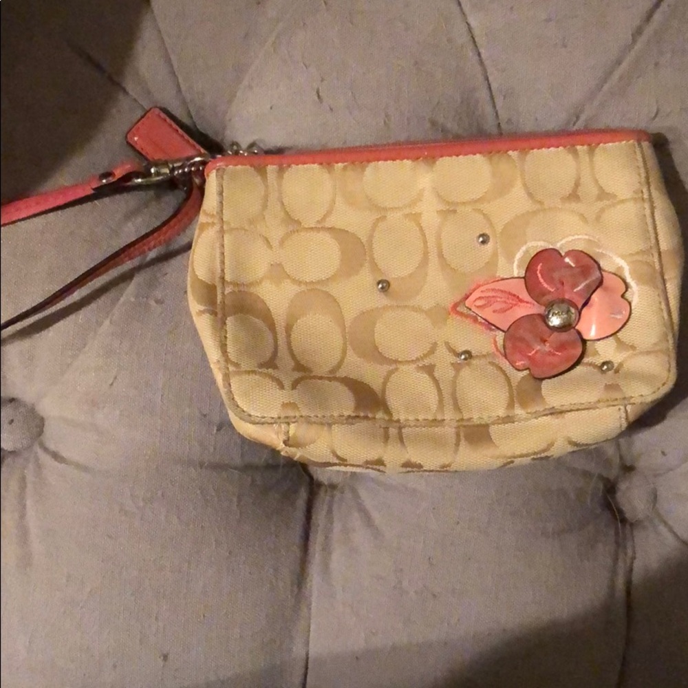 Beige and coral floral coach wristlet